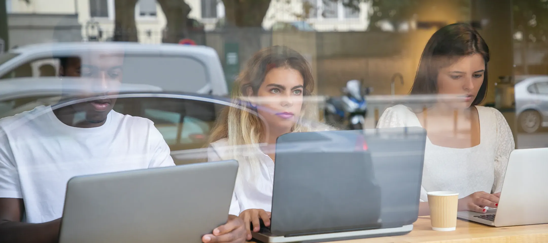 Simultaneous users working, sharing, transfering, studying a cafe restaurant lounge with better WTC wireless and powered by fibre internet Elevate package with SmartBiz from WTC Communications Kingston