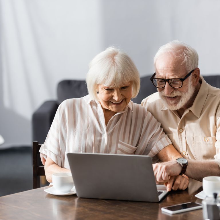 Couple Using Laptop Together